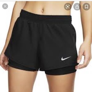 Unworn Nike women's running shorts